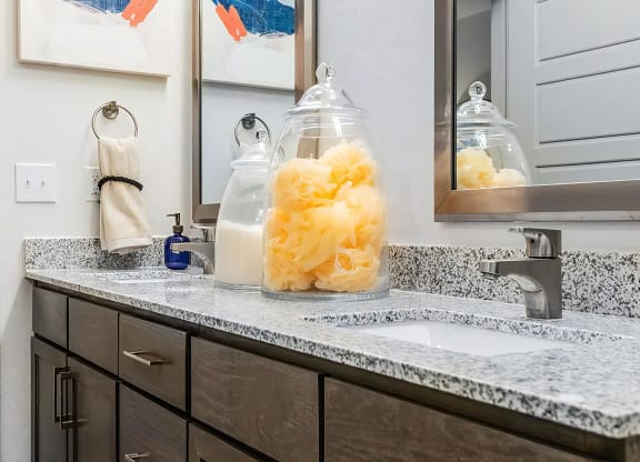 Elegant Granite-Topped Double Vanities with Undermount Sinks
