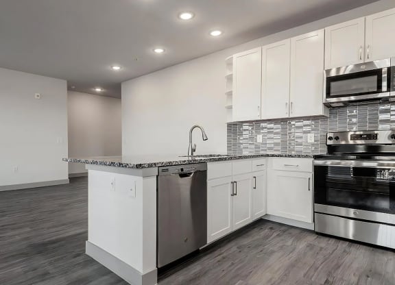 Bright Open-Concept Kitchen with Large Island and Modern Fixtures