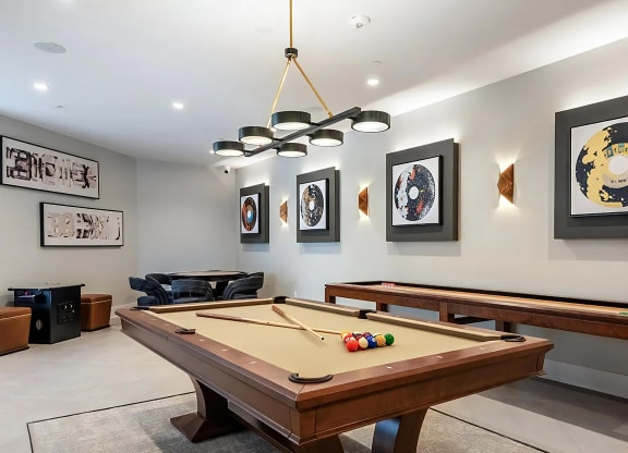 Game Room Featuring Pool Table, Shuffleboard, and Lounge Seating