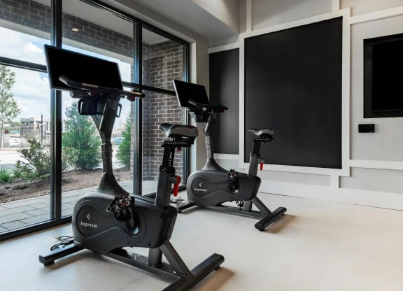 Private Spin Corner with Fitness Bikes and Wall-Mounted Screens