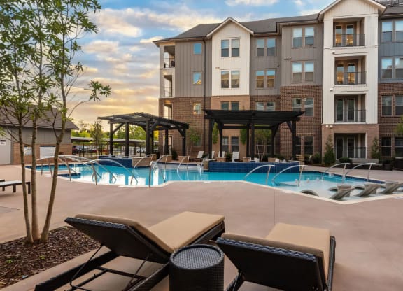 Relax Beside the Pool with In-Water Seating and Sundeck Access