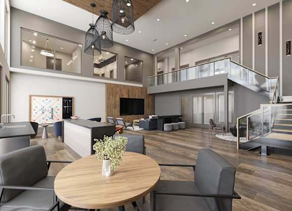 a living room and dining room with a table and chairs