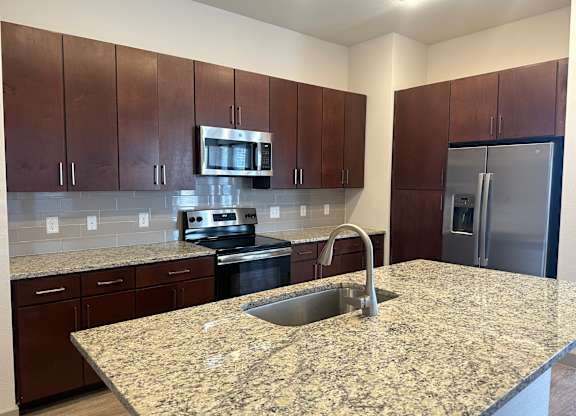 Large Kitchen with Stainless Steel Appliances