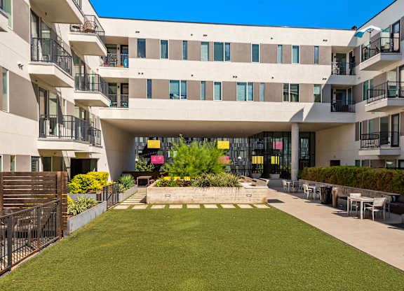 A modern building with a courtyard in the middle.