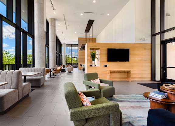 Resident Social Space Featuring Sectional Seating and Media Setup