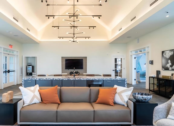 Lounge with Couches and Flat Screen TVs