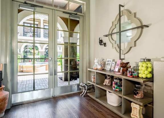 Pet-friendly amenity station offering treats, toys, and essentials for residents’ furry friends.