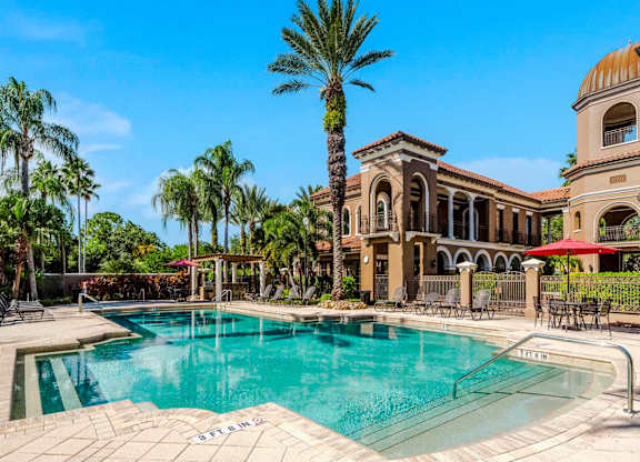Resort pool with palm trees and Mediterranean architecture in St. Petersburg, Florida