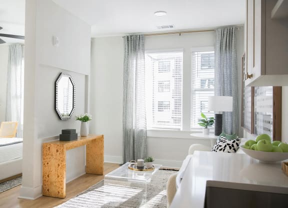 Bright and modern studio space with tall ceilings and abundant natural light at Novel Cary