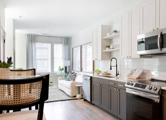Luxurious open floor concept with social dining and living area at Novel Cary