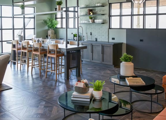 Intimate dining area with wet bar and plateful seating at Novel Cary
