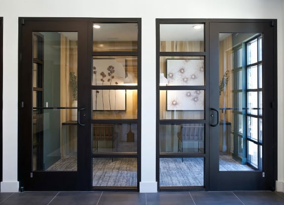 Multiple private office areas with desks and cozy lighting at Novel Cary