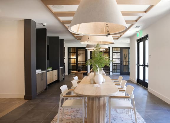 Sophisticated working area with countertop wired with plugs for easy charging at Novel Cary