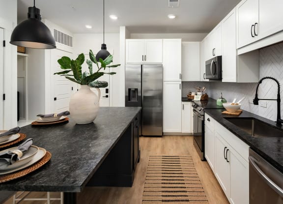 Island Kitchen with Ample Cabinet Space and Self-Closing Drawers