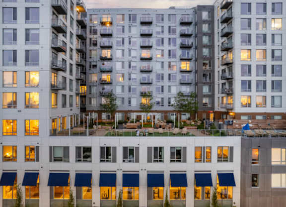 A large building with a lot of windows and balconies.