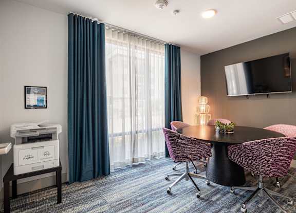 Rhythm Business Center with TV and Printing