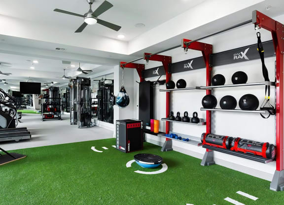 Fully Equipped Gym with Cardio Equipment and Functional Training Area