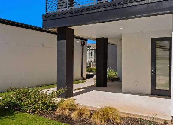 Ground-Level Outdoor Space with Walkway Access at Rhythm Apartments
