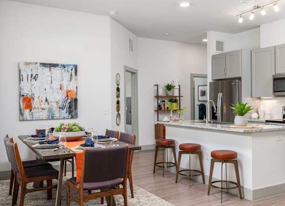Rhythm High-End Kitchen with Granite Counters and Stainless Steel Appliances