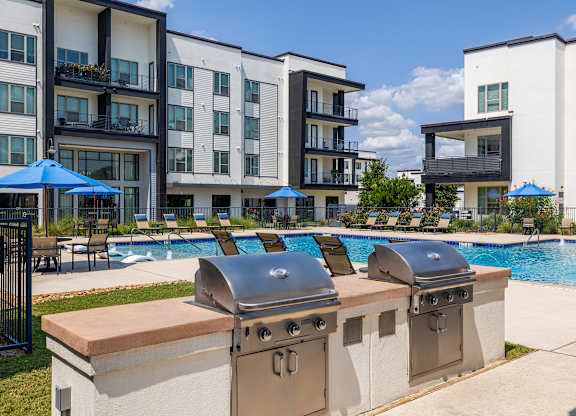 Rhythm Resort-Style Pool with Grills