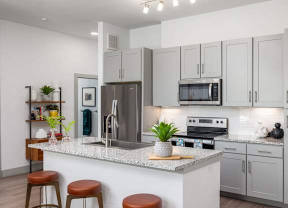 High-End Kitchen with Granite Counters and Stainless Steel Appliances
