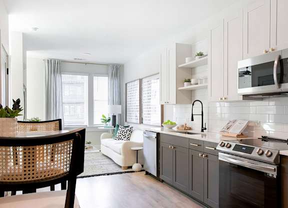 Luxurious open floor concept with social dining and living area at Novel Cary