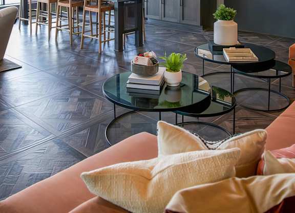 Intimate dining area with wet bar and plateful seating at Novel Cary