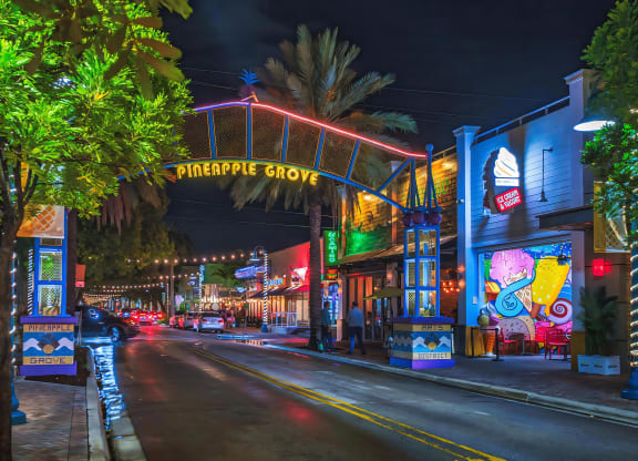 Nighttime View of Pineapple Grove Entrance Near South of Atlantic