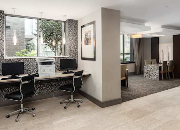 Work-From-Home Ready Space Featuring Computers, Printer, and Natural Light