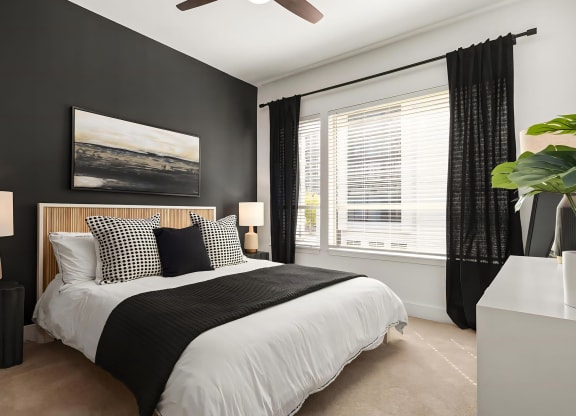 Modern Bedroom Featuring Statement Wallpaper and Generous Windows