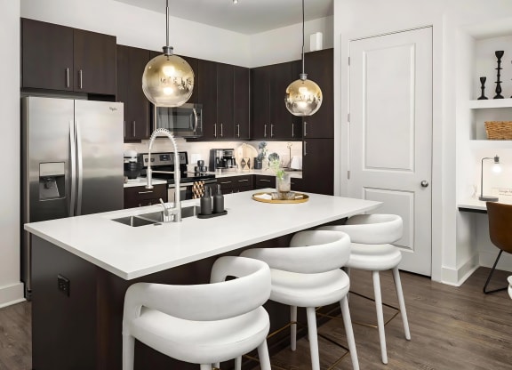 Spacious Kitchen with Quartz Island and Pendant Lighting