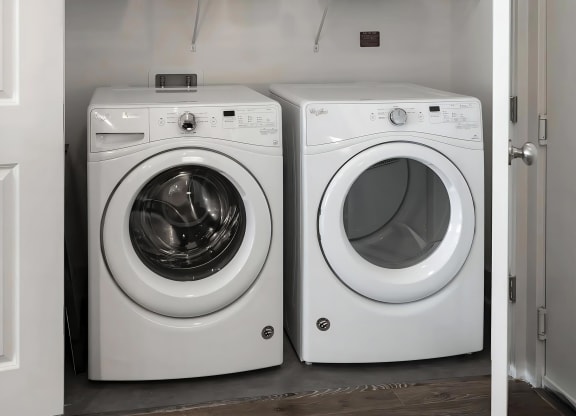 Side-by-Side Front-Loading Laundry Machines in Apartment Unit