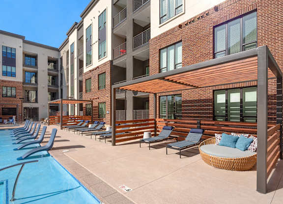 Modern Poolside Amenity with Relaxation Zones and Stylish Pool Furniture