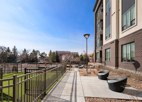 Community Green Space with Resident Seating and Secure Pet Areas