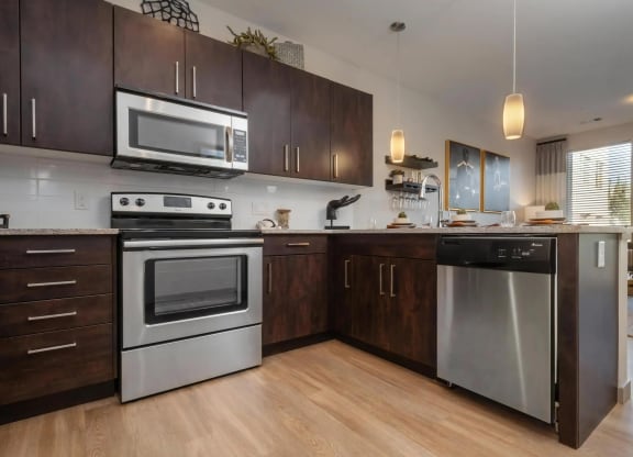Granite Countertops and Sleek Appliances