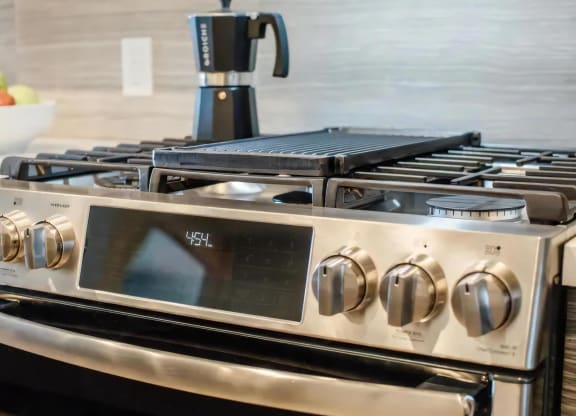 Fully-Equipped Kitchen Featuring Modern Stainless Steel Appliances