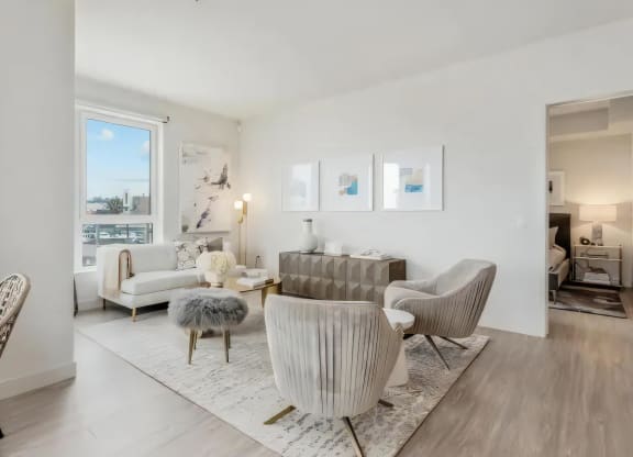 Bright Living Room with Expansive Windows and Elegant Décor