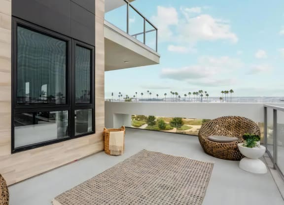 Peaceful Private Balcony with Ocean Views and Lounge Chairs