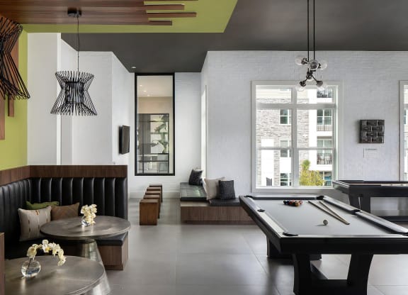 Game Room with Lounge Booths, Pool Table, and Bold Modern Design