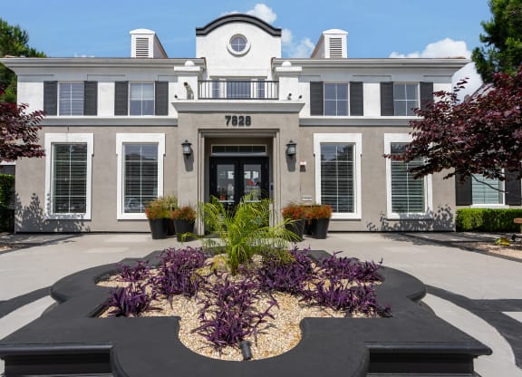 Main Leasing Office at Villas at the Gardens with Planters and Modern Design