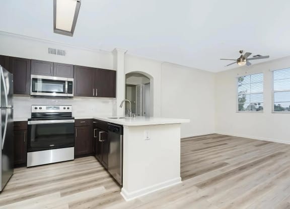 Open Floor Plan with Kitchen Island Overlooking Living Area