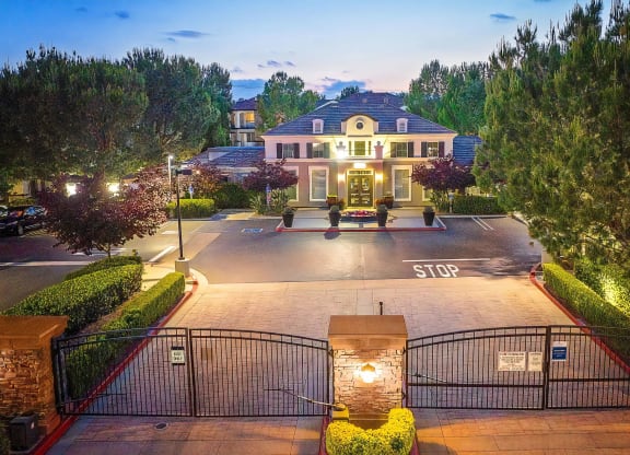Dusk View of the Gated Clubhouse at Villas at the Gardens