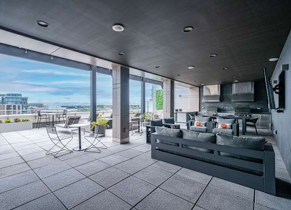 A modern living room with a view of the city.