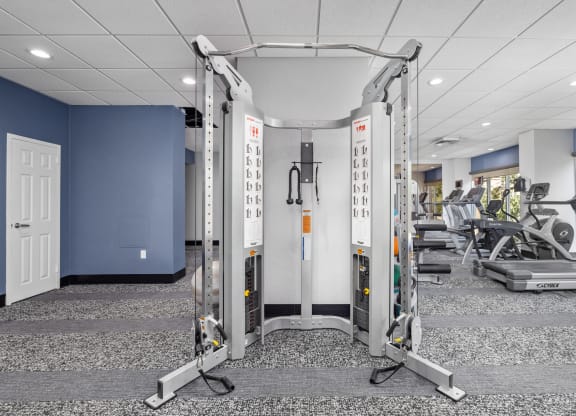 a photo of a fitness room with exercise equipment