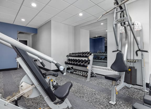 the gym at the enclave at woodbridge apartments in sugar land, tx