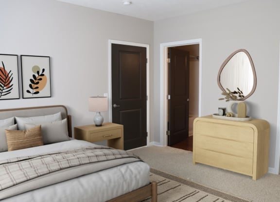 a bedroom with a bed and a dresser with a mirror