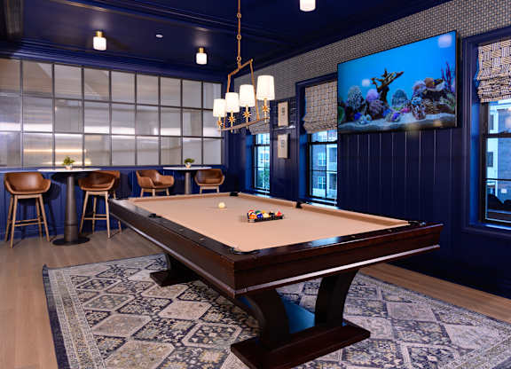 Game room with pool table and aquarium at Fairmont Apartments, Ohio, 43081