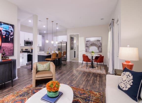 a living room and kitchen with a table and chairs at Essex, Columbus, Ohio, 43212