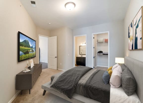 a master bedroom with a bed and a closet at Essex, Columbus, Ohio, 43212