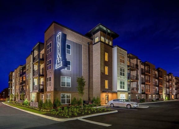 a rendering of an apartment building at night at Taylor House Apartments, Columbus, Ohio